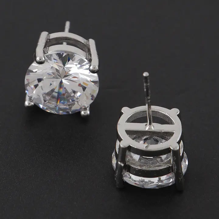 Large silver cubic zirconia stud earrings showing post back and prong setting construction