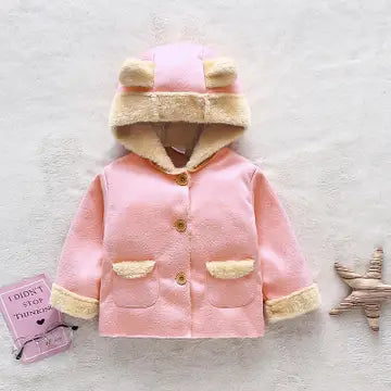 Pink children's coat with bear ears on a light gray background
