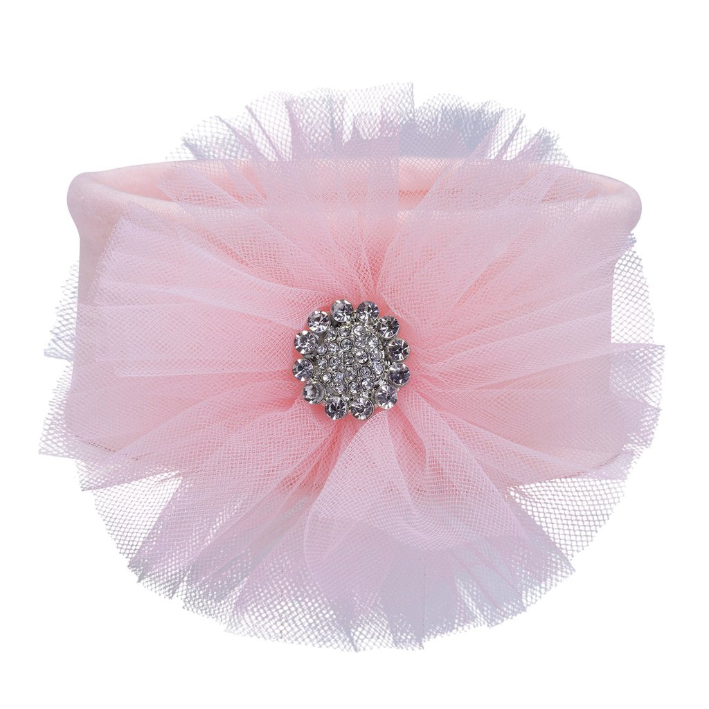 Soft pink tulle baby headband with sparkling rhinestone center on white background