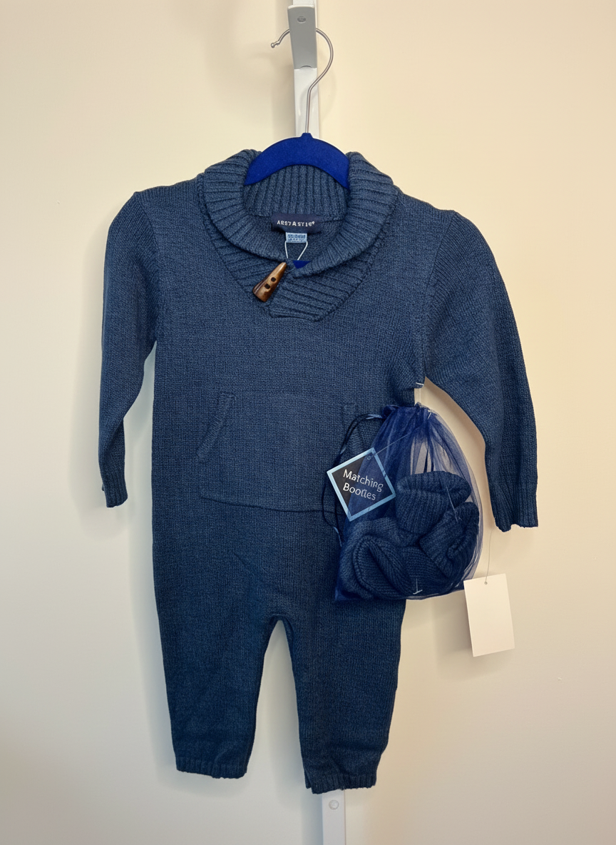 Navy blue knit baby boy sweater set with shawl collar, matching pants, and booties in gift bag by Andy & Evan