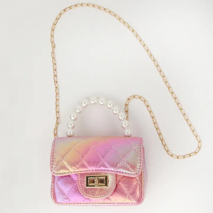 Girls' pink quilted crossbody purse with pearl handle and gold chain strap in shimmery finish