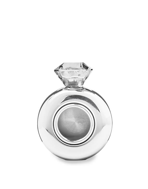 This image features the Diamond Flask, a sophisticated and stylish beverage container. The flask is crafted from a shiny, metallic material and is round in shape with a prominent, crystal-like diamond mounted on top.