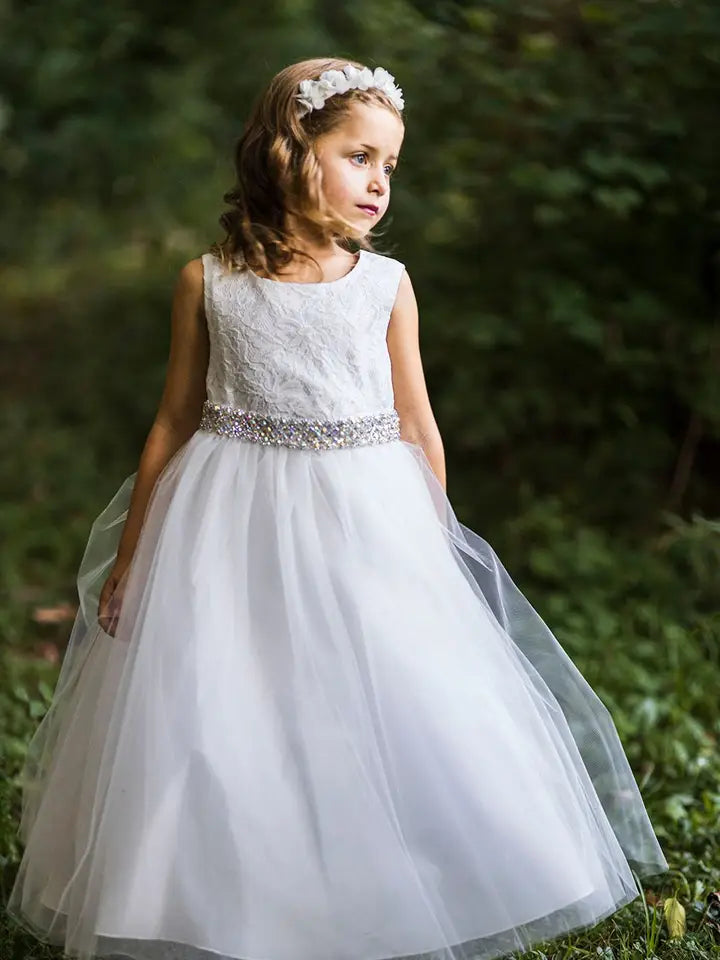Girl wearing white bridal lace tea-length dress with rhinestone waist belt and tulle skirt - front view