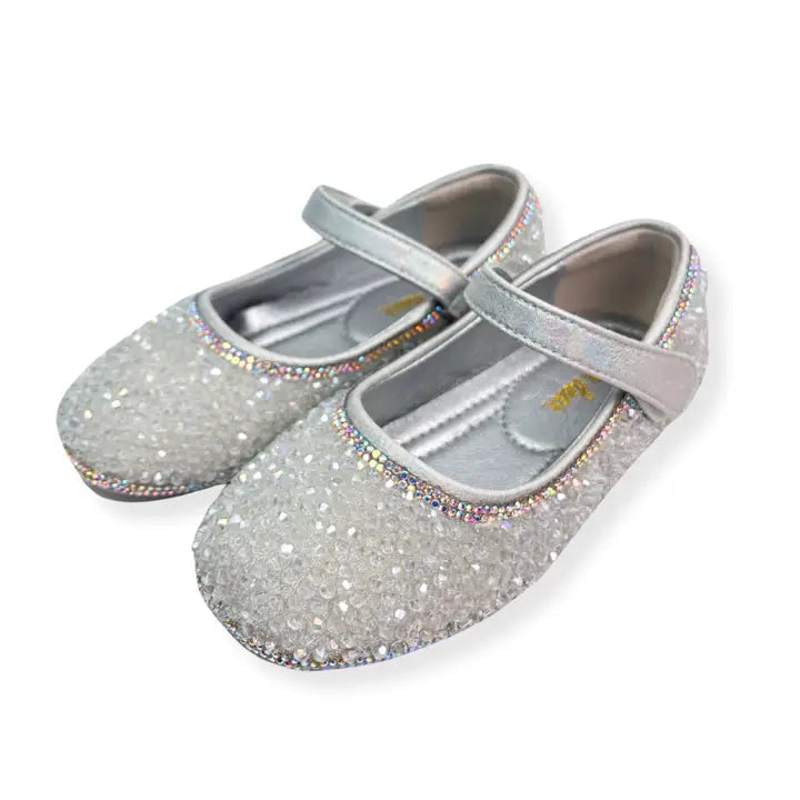 Girls' silver glitter Mary Jane flats with rhinestone trim and adjustable strap on white background