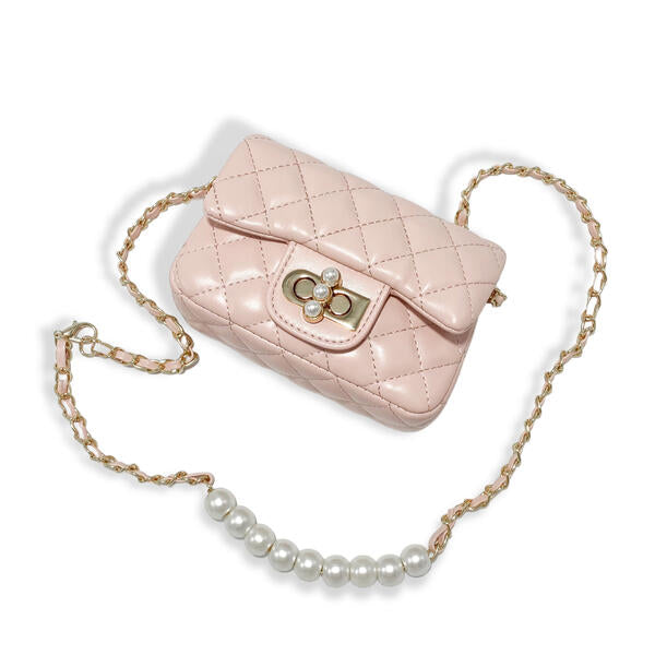Blush pink quilted girls purse with pearl closure charm and gold chain strap on white background
