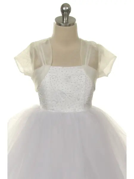 Close-up of girls' ivory organza bolero showing delicate sheer fabric and short sleeve detail for weddings and communion