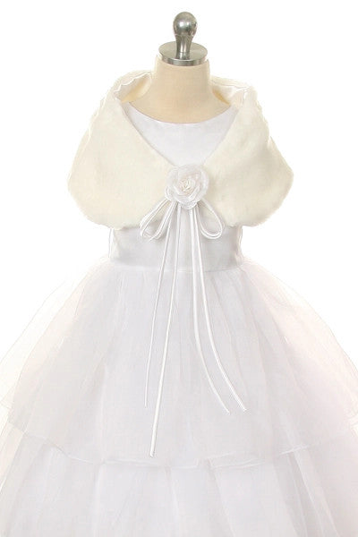 Ivory faux fur shawl with white rose brooch on dress form over formal dress