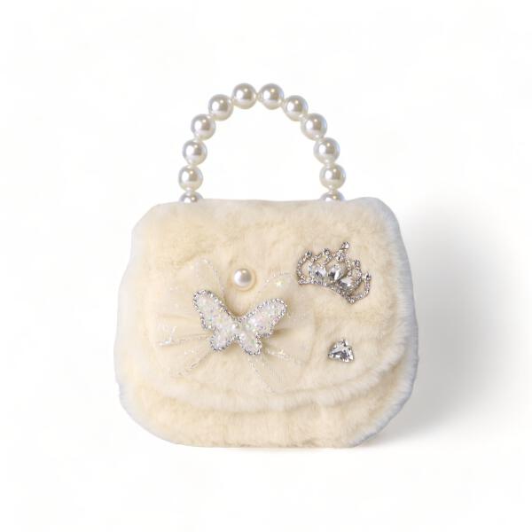 A beige faux fur handbag with a pearl-like beaded handle and decorative butterfly and paw print embellishments.