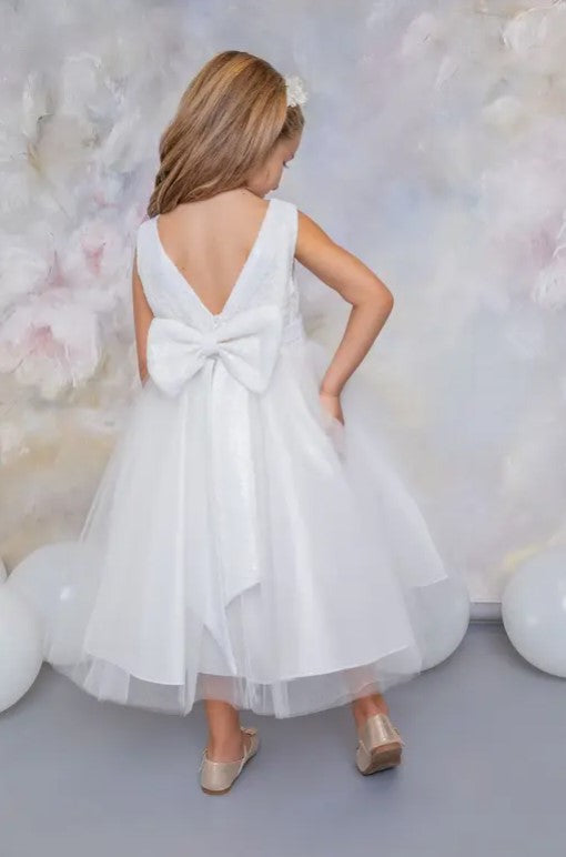 Back view of girls' bow back tulle dress showing statement V-back design and embroidered bodice