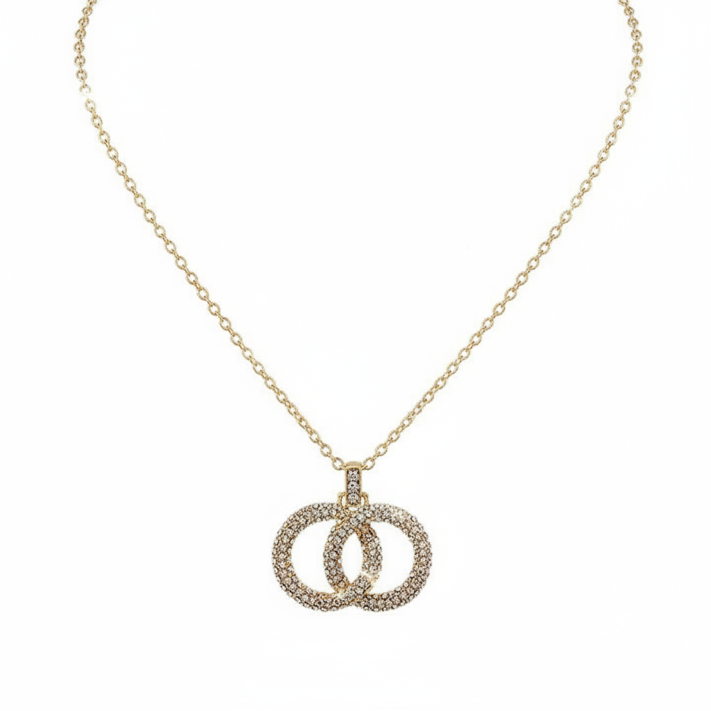 Gold infinity necklace hero shot on white background