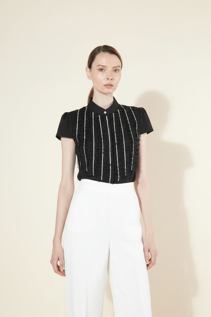 Black boucle fringe sequin crop top editorial view – Beulah statement top