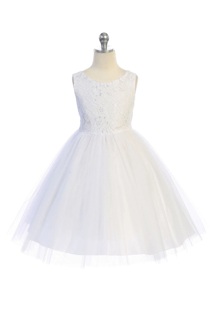 Full-length view of girls' white lace and tulle gown showing four layers of illusion tulle