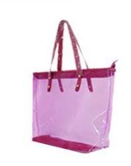 Pink transparent jelly tote bag with pink handles and trim shown from front angle