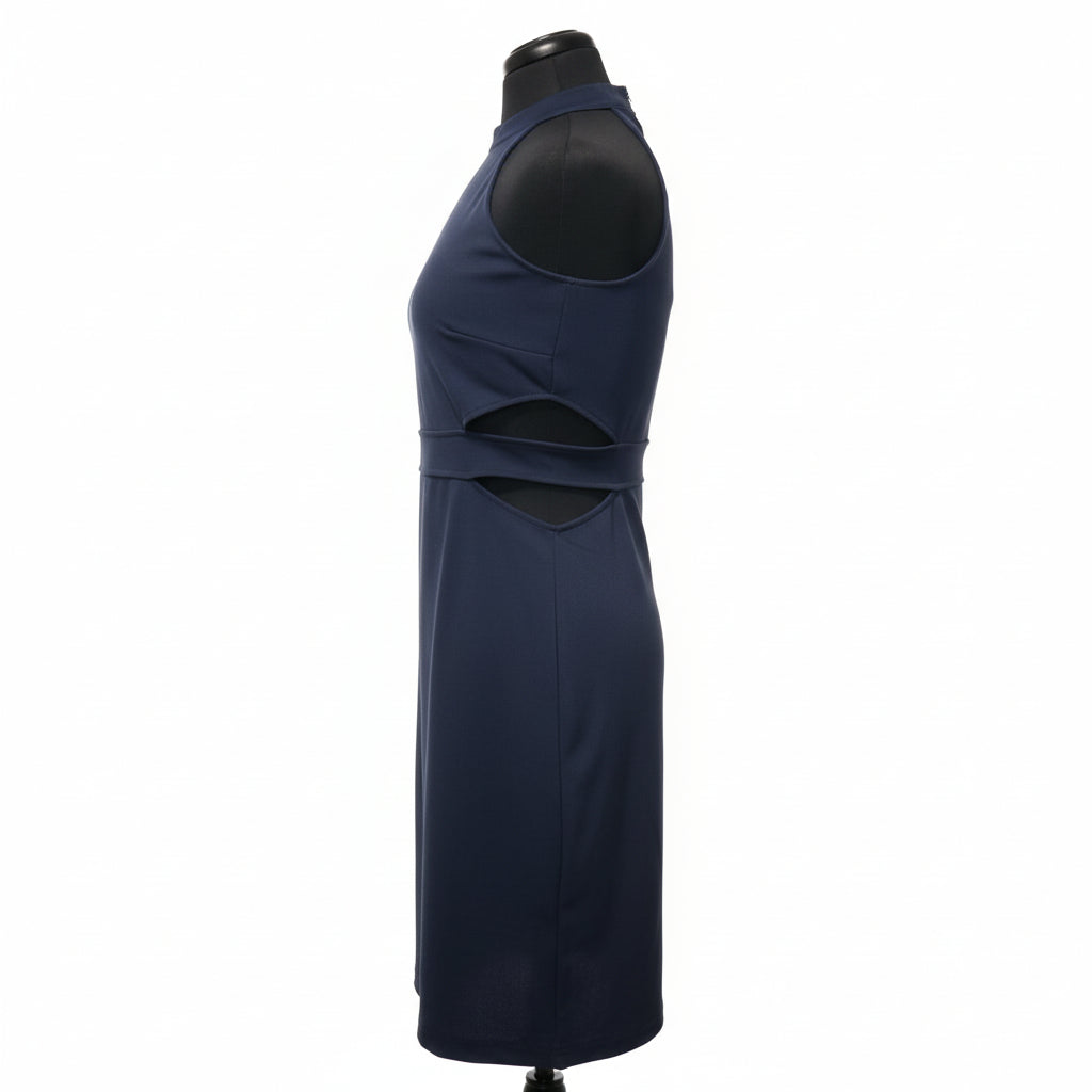 Navy halter dress with geometric waist cut-out details on dress form, side view showing sleeveless design