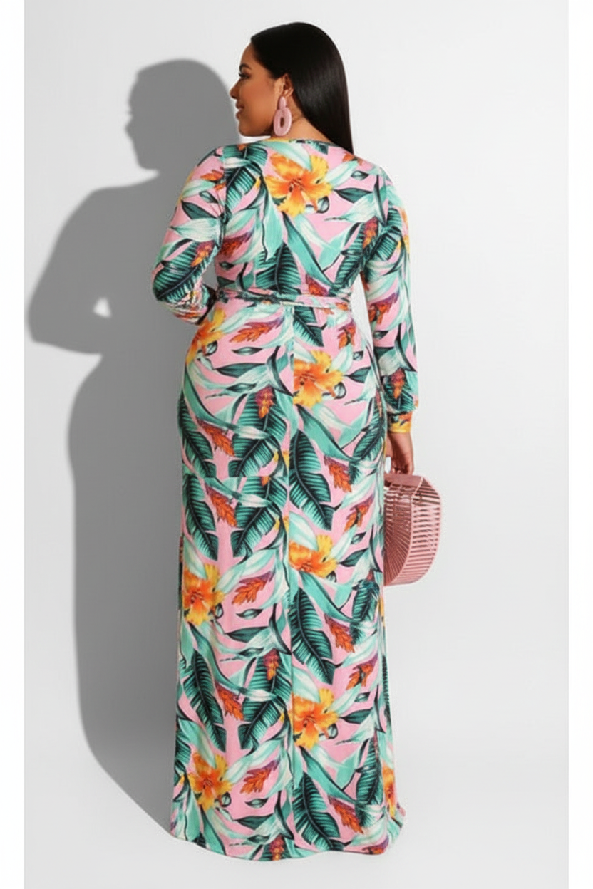 lus size pink tropical floral leaf print wrap maxi dress back view — floor-length hem, long sleeves, tie waist, white studio background