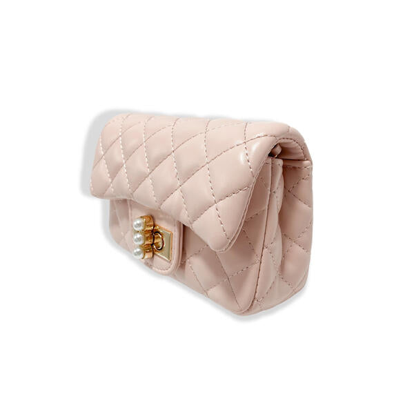 Blush pink quilted girls purse with pearl closure charm on white background, angled view