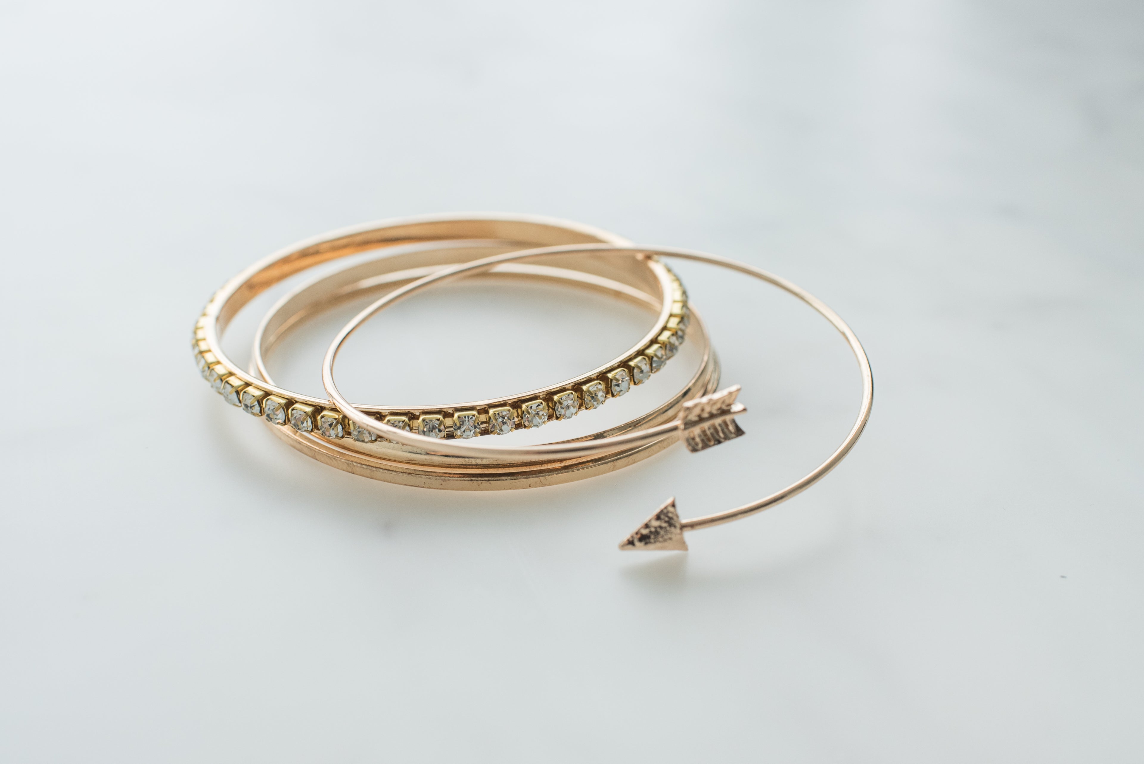 stacked gold bracelets