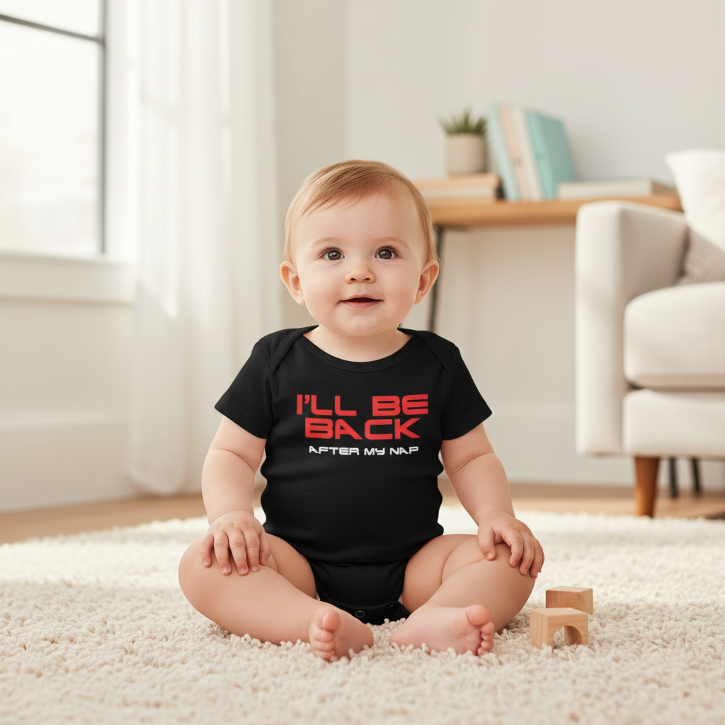 Baby wearing black Terminator onesie in natural home setting with soft lighting