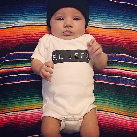 Baby wearing El Jefe boss onesie size 6-12 months