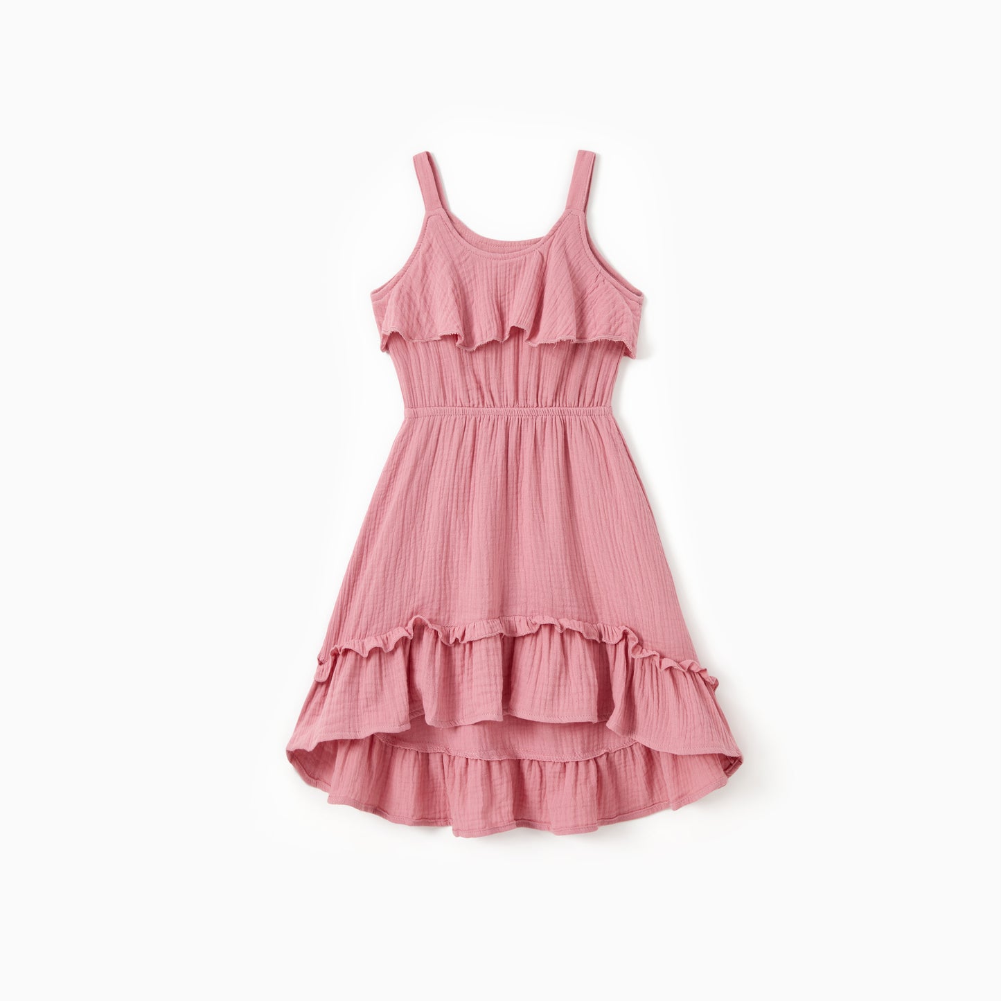 Pink dress with ruffled layers on a white background