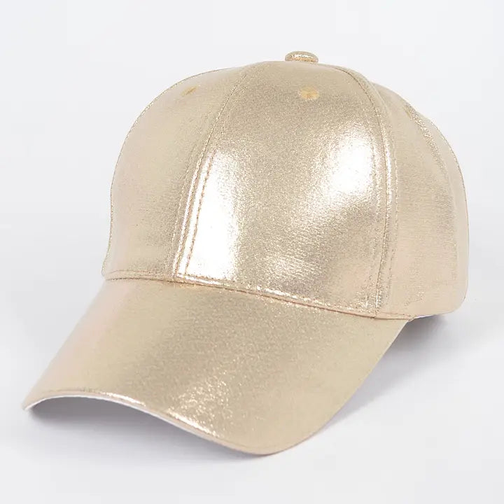 Gold metallic baseball cap on a white background