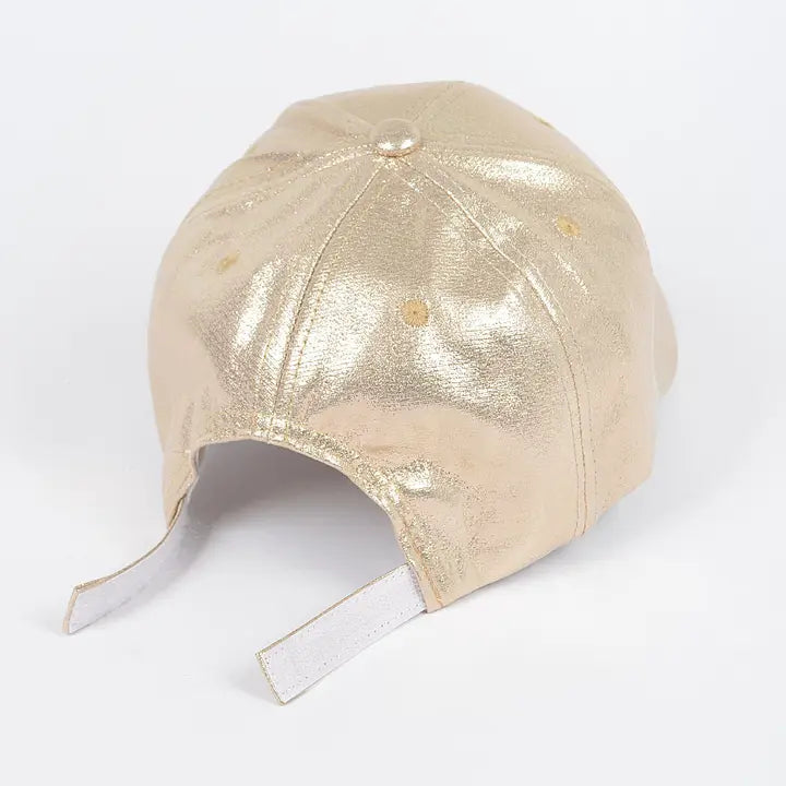 Gold metallic cap on a white background