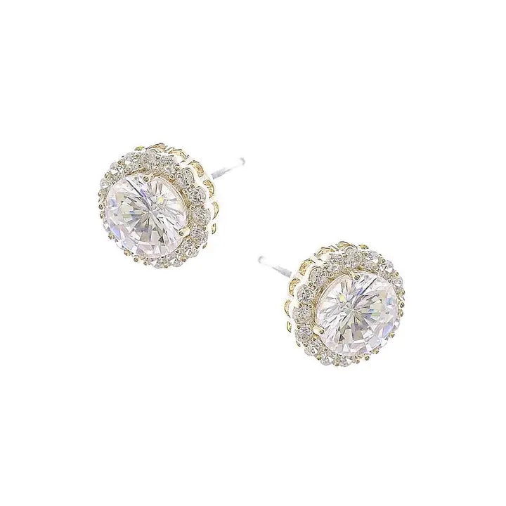 Pair of gold and crystal stud earrings on a white background