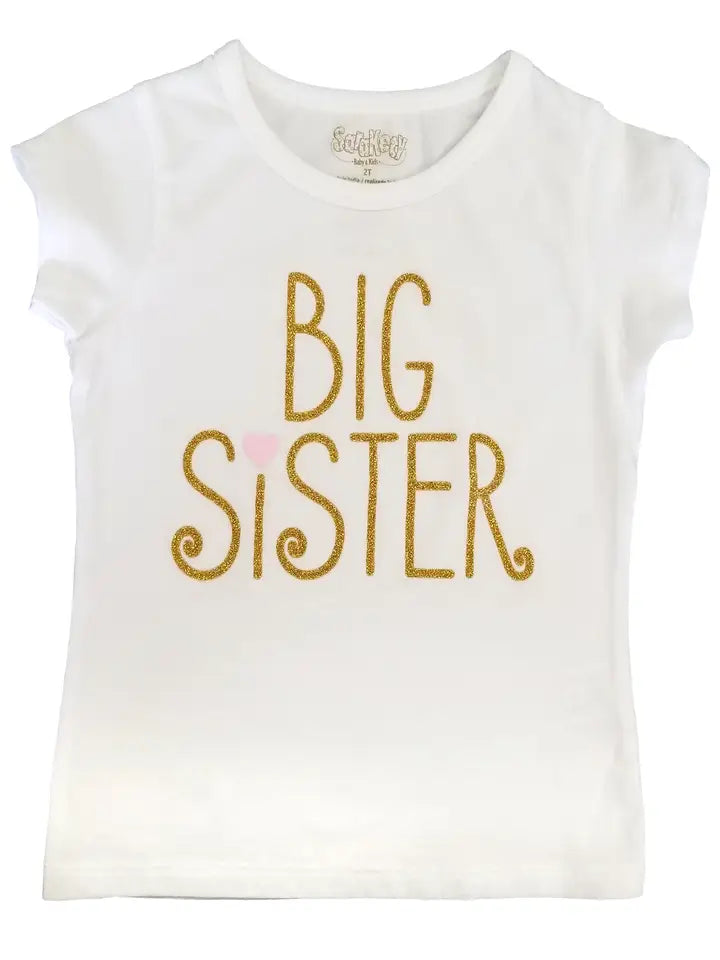 White t-shirt with 'BIG SISTER' in gold glitter letters on a white background