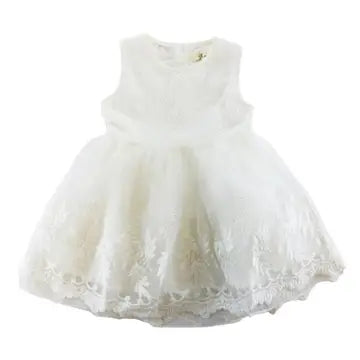 Girls' white sleeveless tulle gown with embroidered bodice and sparkling embellished hem on white background