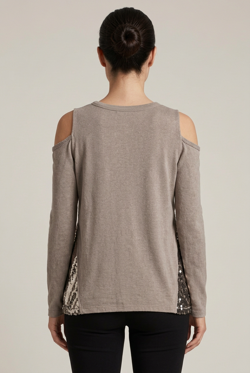 Back view of a taupe cold-shoulder long-sleeve top with a plain back and metallic sequin side panels