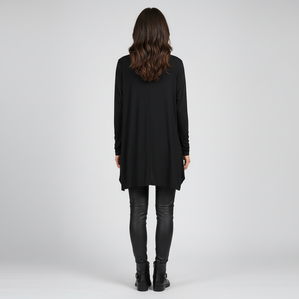 Back view of woman wearing Black and Rose Statement Pocket Tunic with leather leggings and boots