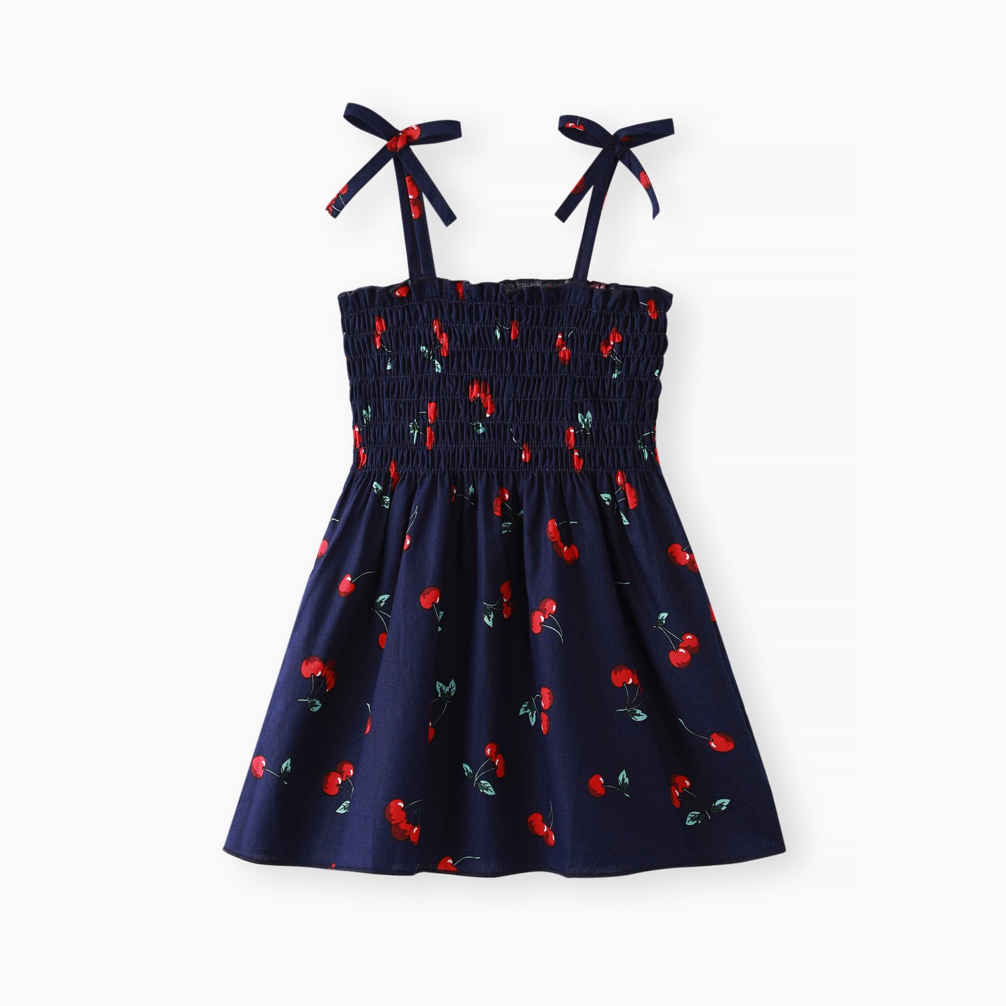 Infant navy blue dress with red cherry print and bow accents on the straps.