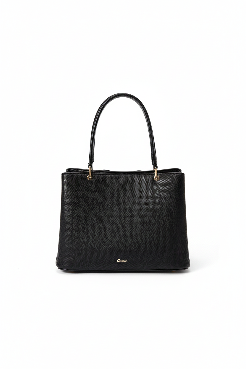 Black bow handbag back view showing clean panel and brand detail on white background