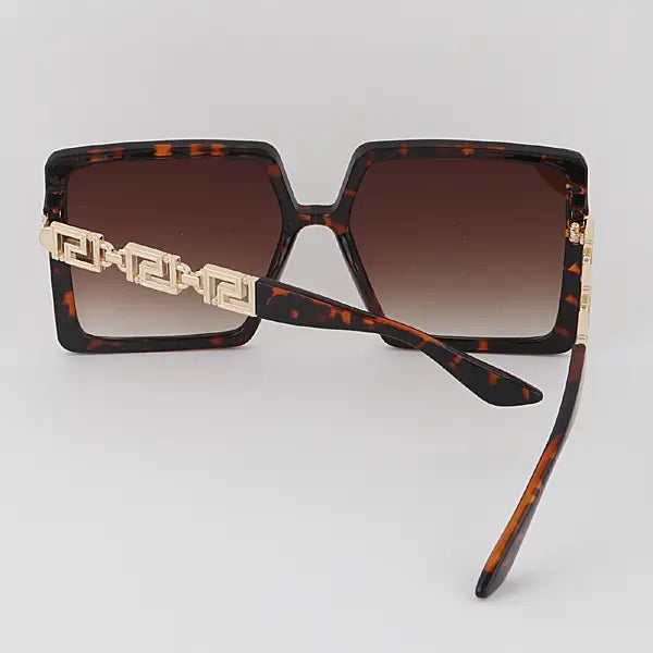 Tortoise square sunglasses featuring gold Greek key detail