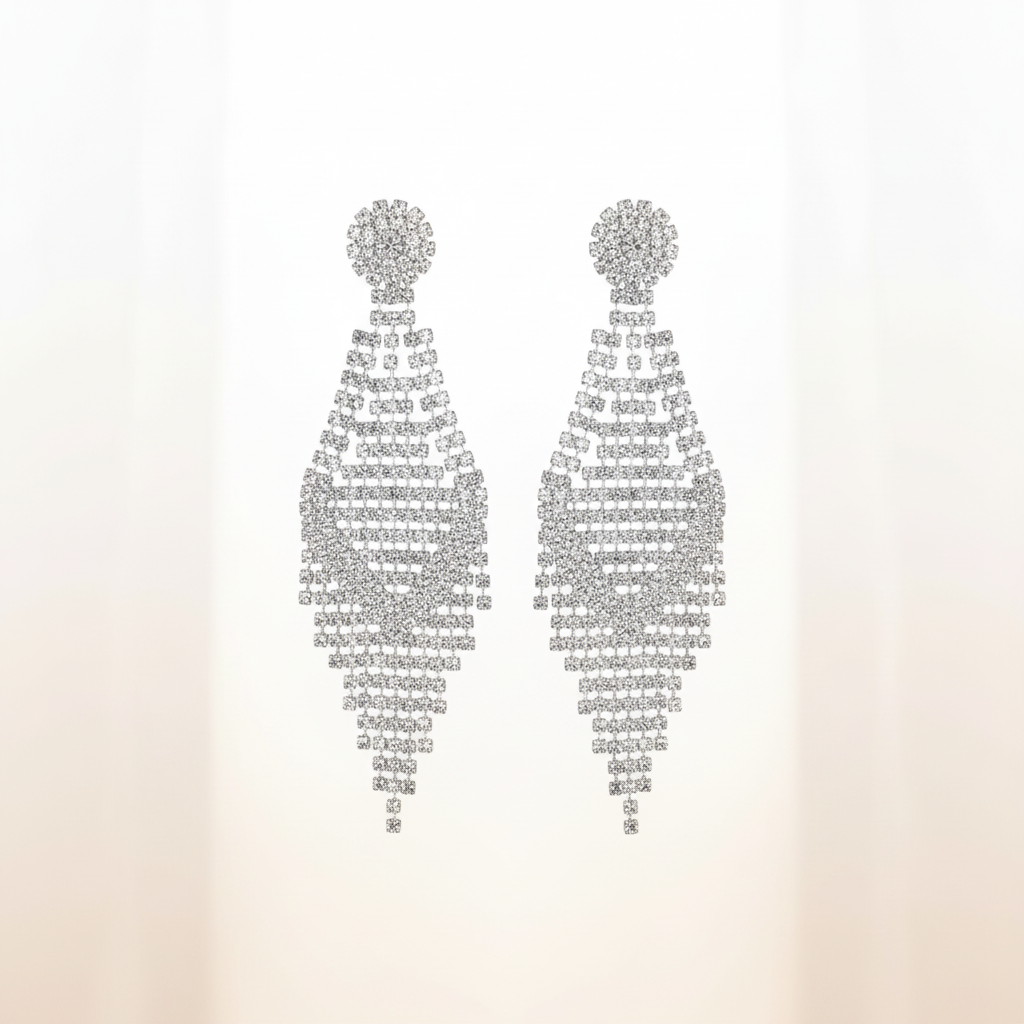Light and elegant hero banner featuring diamond accent chandelier earrings with geometric lattice design on soft white background, highlighting 3.5-inch length and brilliant rhinestone sparkle