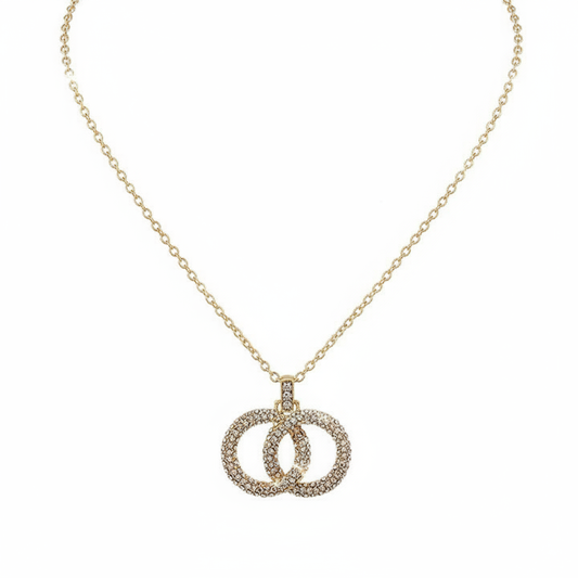 Gold infinity necklace hero shot on white background