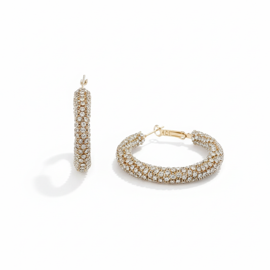 Gold rhinestone wrapped hoop earrings hero with shadow and sideways angle