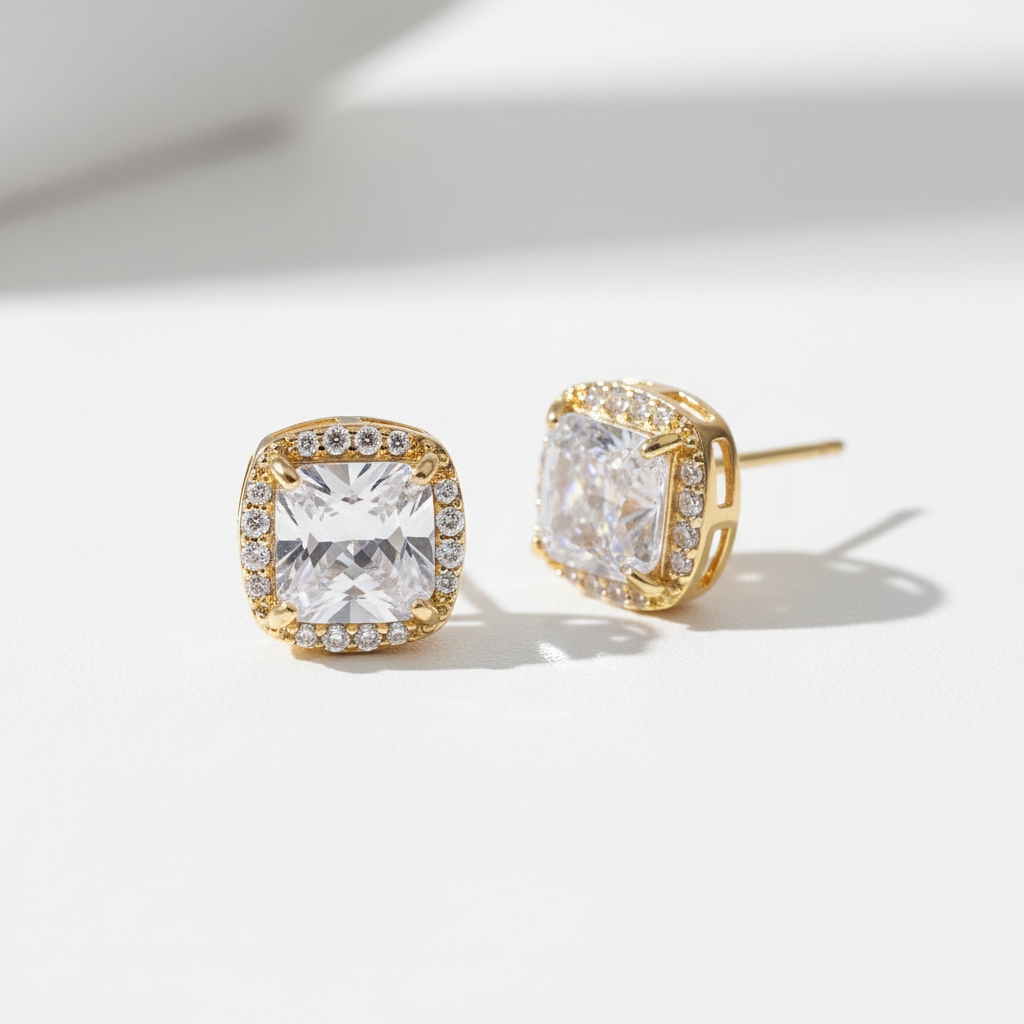 Gold-tone CZ stud earrings studio shot