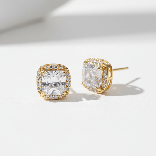 Gold-tone CZ stud earrings studio shot