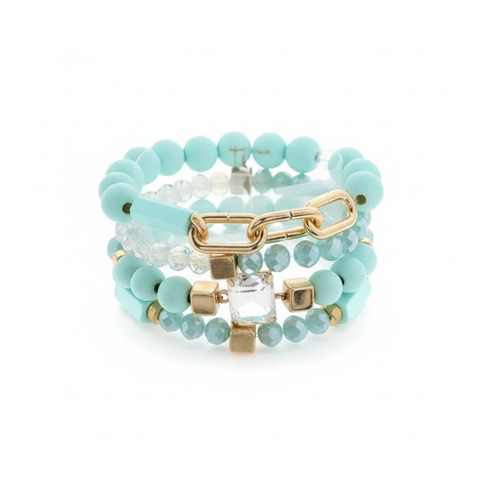 Hero image of mint and gold stretch bracelet set on white background