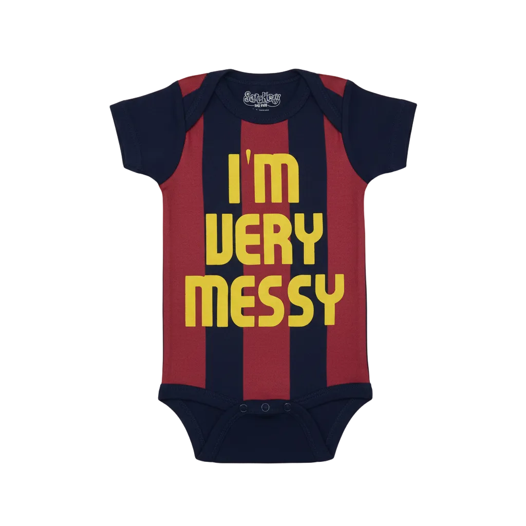 Navy and red striped soccer jersey baby onesie with yellow I'm Very Messy text, premium flat lay boutique product photography