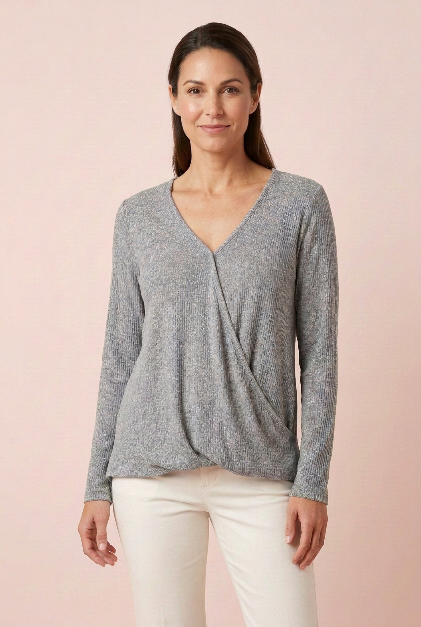 Heather gray ribbed surplice long sleeve top with draped crossover front and ivory trousers, three-quarter view for casual outfit styling