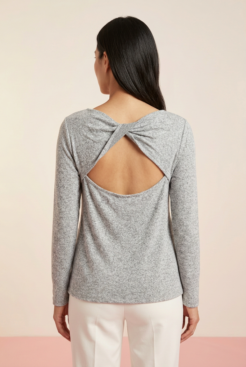 Heather gray marled knit long sleeve top showing twisted upper-back detail and open-back cutout, back view