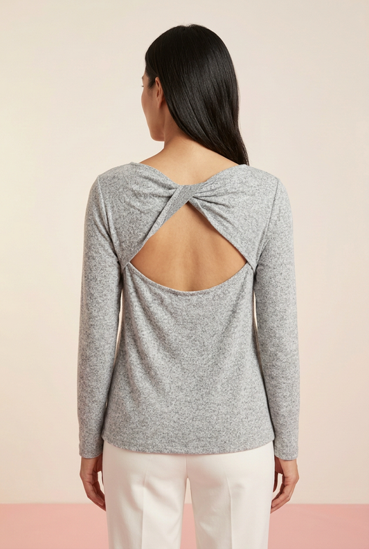 Heather gray marled knit long sleeve top showing twisted upper-back detail and open-back cutout, back view