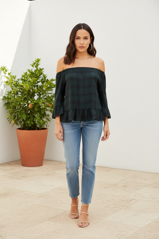 Green plaid off the shoulder bell sleeve top spring lifestyle styling light wash jeans neutral outdoor setting