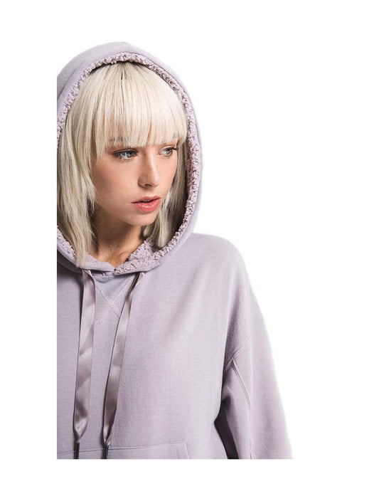 Close-up of sherpa fleece-lined hood interior on lavender grey hoodie showing plush texture and drawstring
