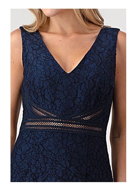 Close-up of navy lace gown showing V-neckline, floral lace pattern, and sheer mesh waist panel detail