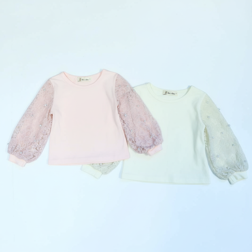 Flat Lay of Pearl & Lace Lantern Sleeve Tops
