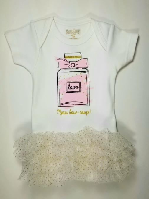 White baby onesie with a pink bottle design and 'love' text on a white background