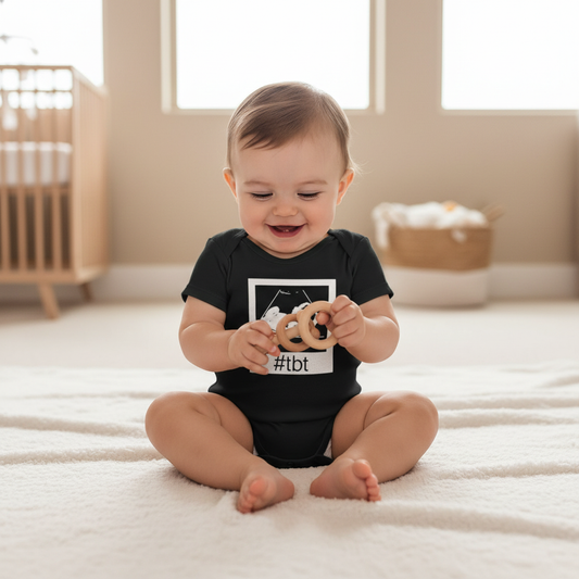 Black baby onesie with sonogram ultrasound image and #TBT text on a baby